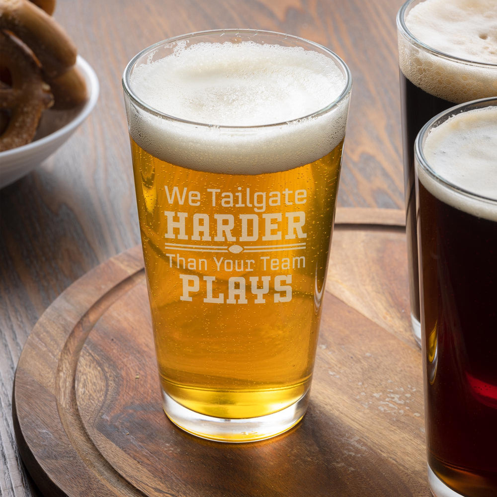 We Tailgate Harder Than Your Team Plays Etched Pint Glass